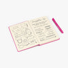Libreta punteada color rosada + 1 bolígrafo